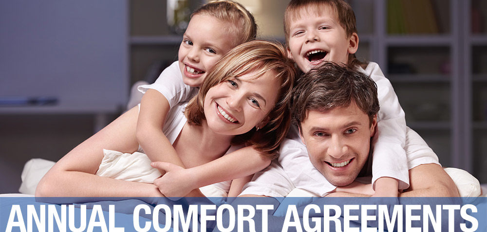 family happy to sign an HVAC annual comfort agreement